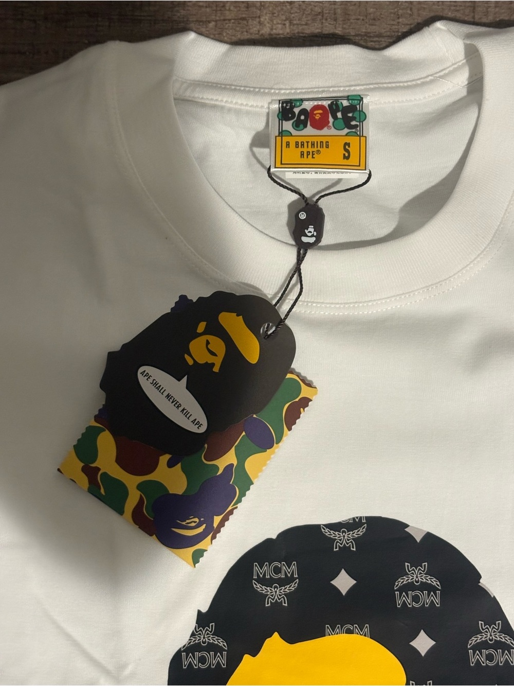 A Bathing Ape White Graphic Tee with Black & Yellow Logo